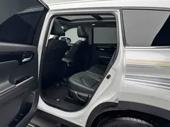 2022 Toyota Highlander Hybrid 2.5L 4WD Premium 7-seat, белый — фото 8
