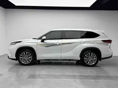 2022 Toyota Highlander Hybrid 2.5L 4WD Premium 7-seat, белый — фото 16