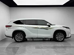 2022 Toyota Highlander Hybrid 2.5L 4WD Premium 7-seat, белый — фото 20