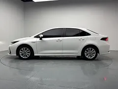 2023 Toyota Corolla 1.8L Hybrid Elite, белый — фото 4