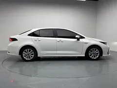 2023 Toyota Corolla 1.8L Hybrid Elite, белый — фото 5
