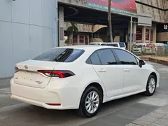 2019 Toyota Corolla 1.2T S-CVT GL-i Elite, белый — фото 4