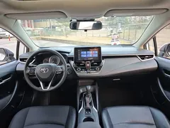2019 Toyota Corolla 1.2T S-CVT GL-i Elite, белый — фото 11