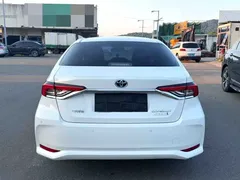 2022 Toyota Corolla 1.8L Hybrid E-CVT, белый — фото 7
