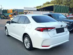2022 Toyota Corolla 1.8L Hybrid E-CVT, белый — фото 9