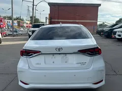 2021 Toyota Corolla 1.2T S-CVT Luxury, белый — фото 4