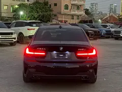 2022 BMW 3 Series 325Li M Sport Dark Package, чёрный — фото 4