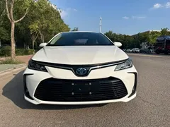 2021 Toyota Corolla Hybrid 1.8L E-CVT Elite, белый — фото 2