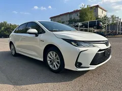 2021 Toyota Corolla Hybrid 1.8L E-CVT Elite, белый — фото 3