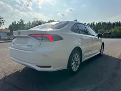 2021 Toyota Corolla Hybrid 1.8L E-CVT Elite, белый — фото 4