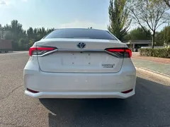 2021 Toyota Corolla Hybrid 1.8L E-CVT Elite, белый — фото 5