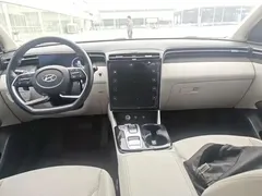 2022 Hyundai Tucson L 2.0L Hybrid Premium, белый — фото 5