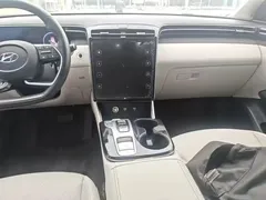 2022 Hyundai Tucson L 2.0L Hybrid Premium, белый — фото 7