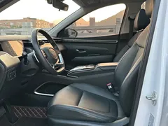 2021 Hyundai Tucson L 1.5T DCT LUX Premium, белый — фото 4