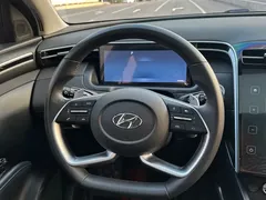 2021 Hyundai Tucson L 1.5T DCT LUX Premium, белый — фото 17