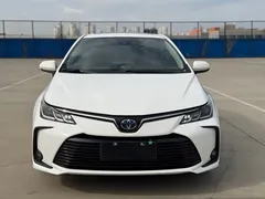 2021 Toyota Corolla Hybrid 1.8L E-CVT Elite, белый — фото 2