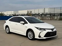 2021 Toyota Corolla Hybrid 1.8L E-CVT Elite, белый — фото 3