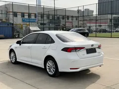 2021 Toyota Corolla Hybrid 1.8L E-CVT Elite, белый — фото 4