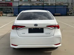 2021 Toyota Corolla Hybrid 1.8L E-CVT Elite, белый — фото 5