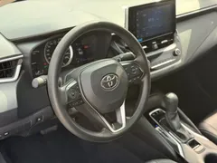 2021 Toyota Corolla Hybrid 1.8L E-CVT Elite, белый — фото 7