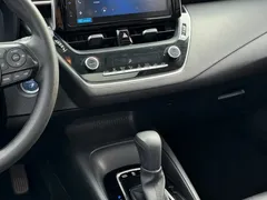2021 Toyota Corolla Hybrid 1.8L E-CVT Elite, белый — фото 8