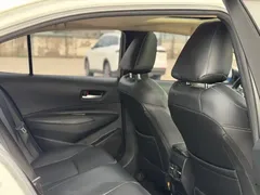 2021 Toyota Corolla Hybrid 1.8L E-CVT Elite, белый — фото 13