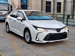 2021 Toyota Corolla Hybrid 1.8L E-CVT Pioneer, белый — фото 1