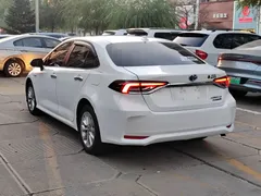 2021 Toyota Corolla Hybrid 1.8L E-CVT Pioneer, белый — фото 4