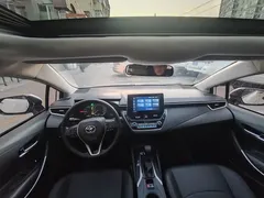 2021 Toyota Corolla Hybrid 1.8L E-CVT Pioneer, белый — фото 8
