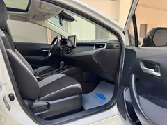 2021 Toyota Corolla 1.2T S-CVT Elite Plus, белый — фото 10