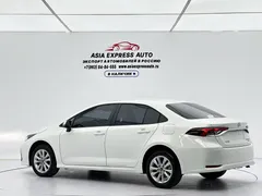 2023 Toyota Corolla 1.2T Elite, белый — фото 4