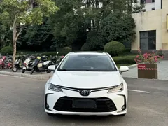 2021 Toyota Corolla Hybrid 1.8L E-CVT Elite, белый — фото 2