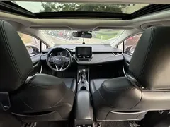 2021 Toyota Corolla Hybrid 1.8L E-CVT Elite, белый — фото 9