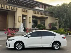2021 Toyota Corolla Hybrid 1.8L E-CVT Elite, белый — фото 15