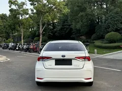 2021 Toyota Corolla Hybrid 1.8L E-CVT Elite, белый — фото 18