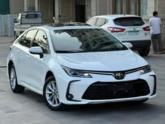 2023 Toyota Corolla 1.2T Elite, белый — фото 1