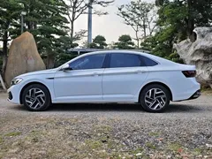 2023 Volkswagen Sagitar 300TSI DSG, белый — фото 20