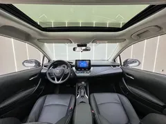 2021 Toyota Corolla 1.2T S-CVT Luxury, белый — фото 21
