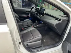 2021 Toyota Levin 1.8H Hybrid E-CVT Sport, белый — фото 11