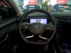 2023 Hyundai Tucson L 1.5T AT 2WD LUX Premium, белый — фото 11