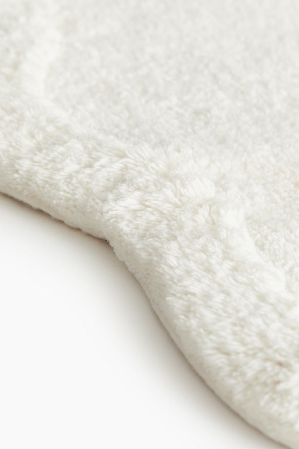 Мягкий хлопковый коврик для ванной H&M Белый 50x70. Фото 3.