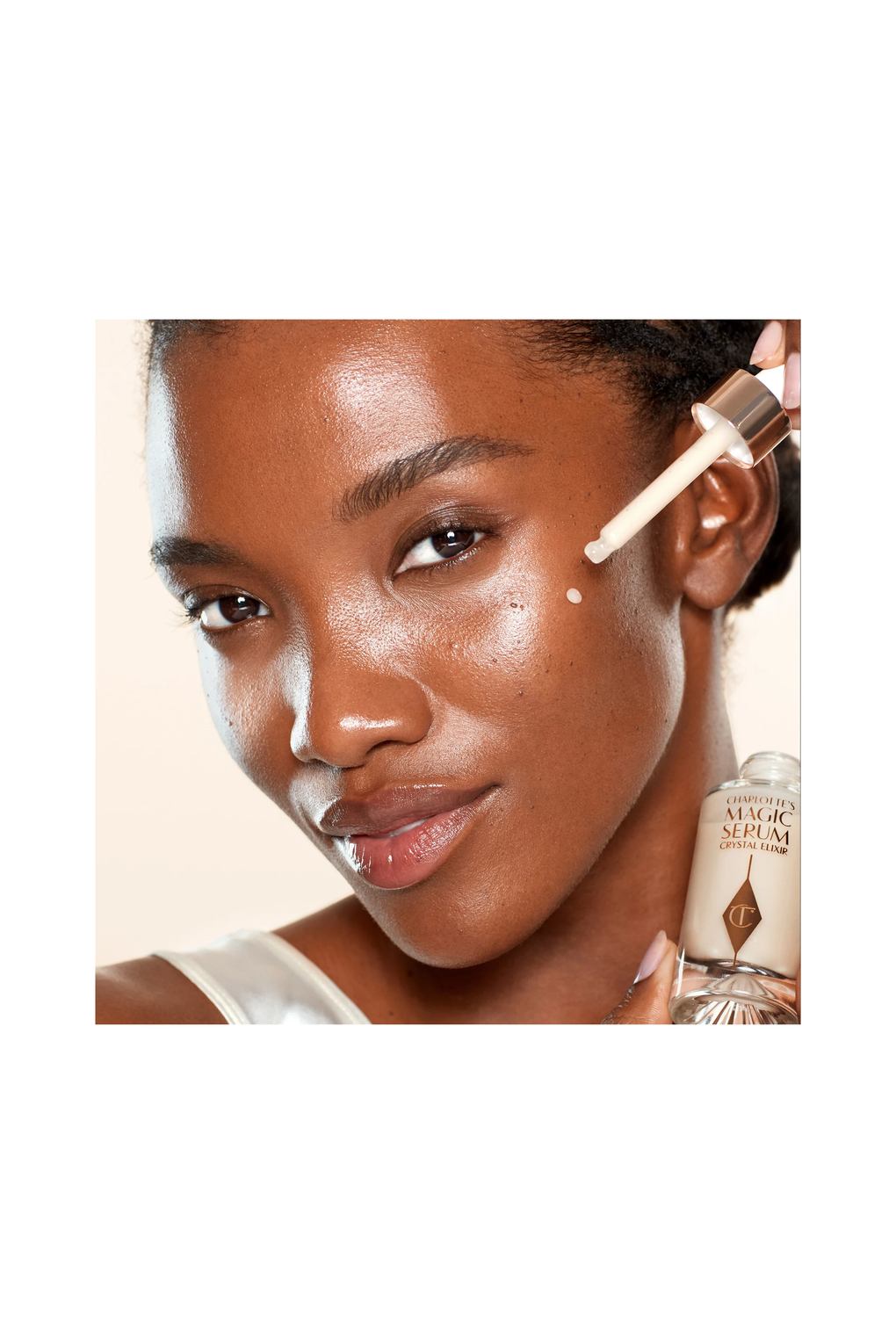 Сыворотка для лица Charlotte Tilbury charlotte's magic serum crystal elixir 100 ml. Фото 3.