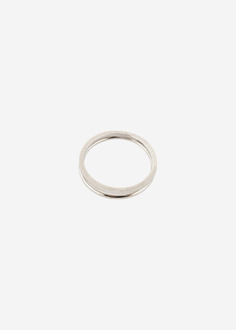 Double ring made of silver Karma