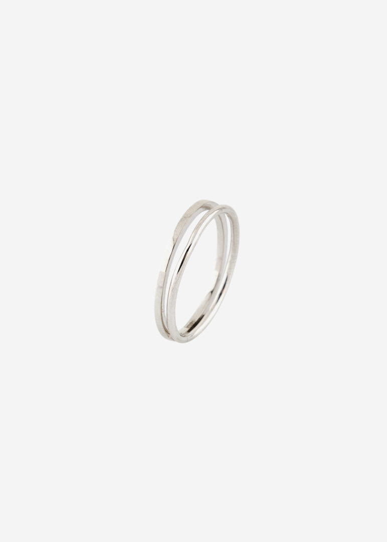 Double ring made of silver Karma