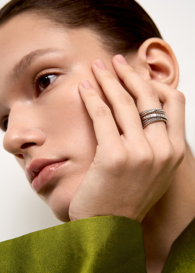 Multilayer ring with crystals