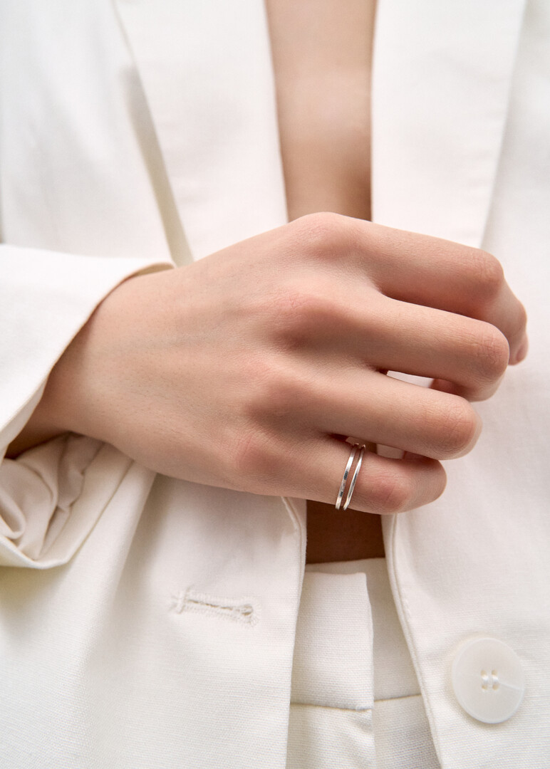 Double ring made of silver Karma