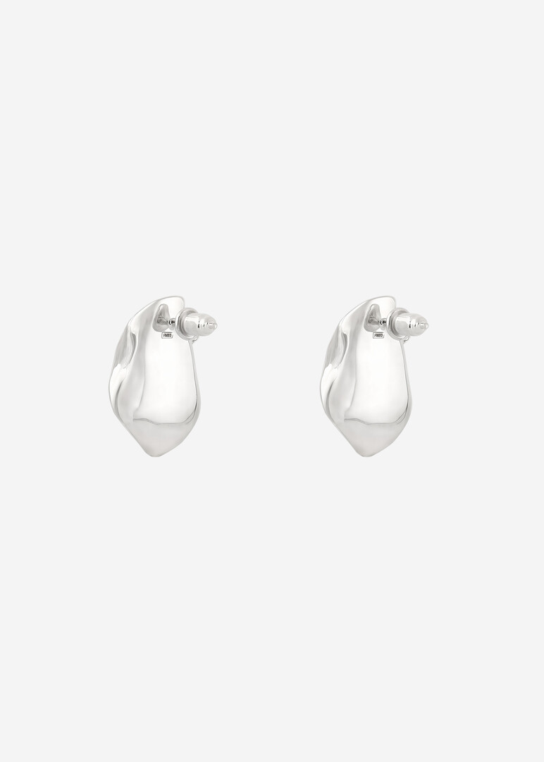 crumpled silver earrings Sexuality