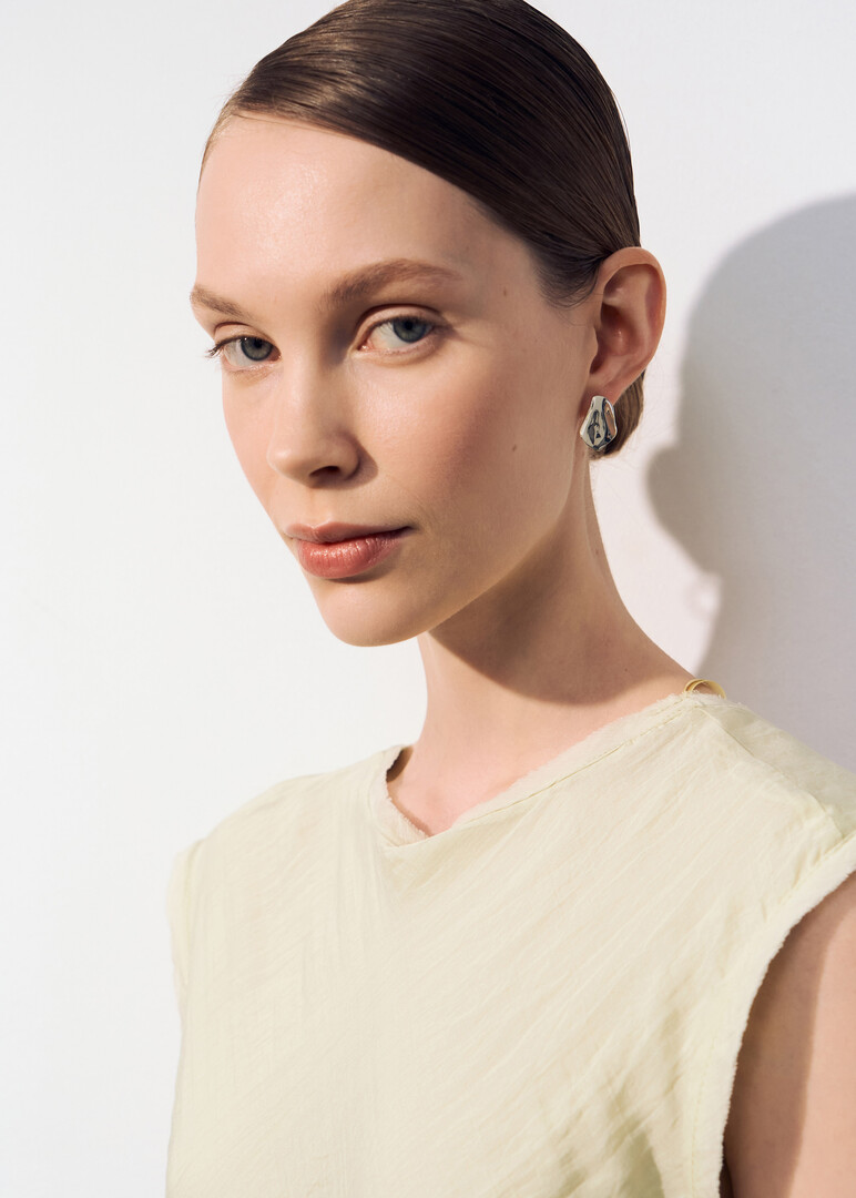 crumpled silver earrings Sexuality
