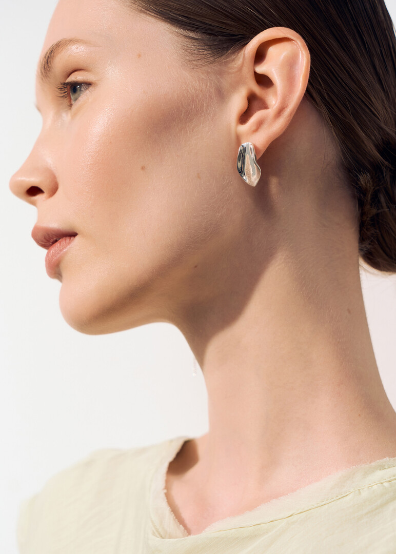 crumpled silver earrings Sexuality