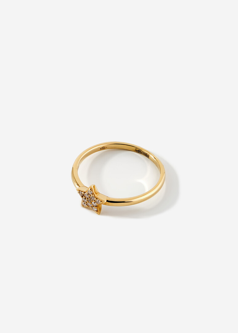 Gold ring with a diamond star.